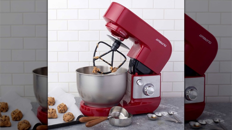 Red stand mixer with cookie dough inside