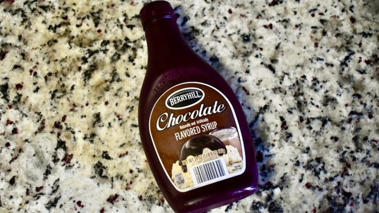 Bottle Aldi Berryhill Chocolate Syrup on a marble countertop