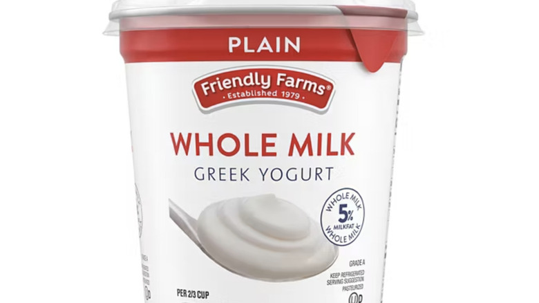 product promo shot of at large container of Aldi's Friendly Farms plain whole milk Greek yogurt