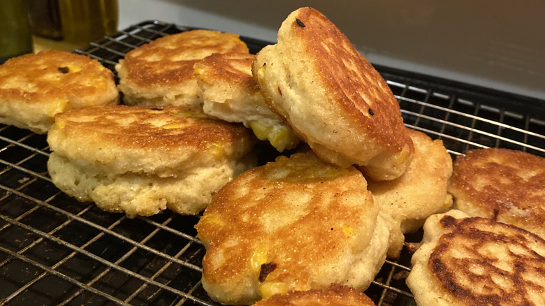 Close up of a pile of golden brown hoecakes