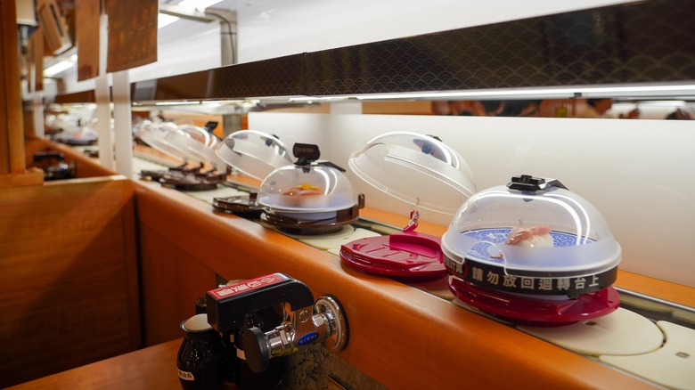 Plates of sushi on a conveyor belt