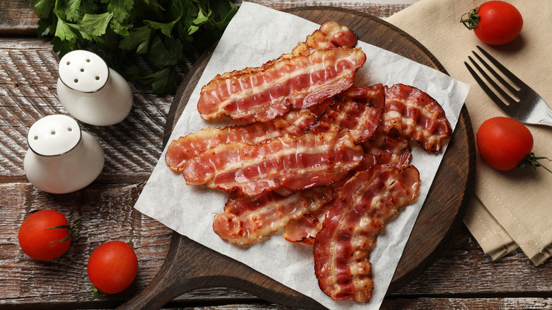Overview of bacon on wood board