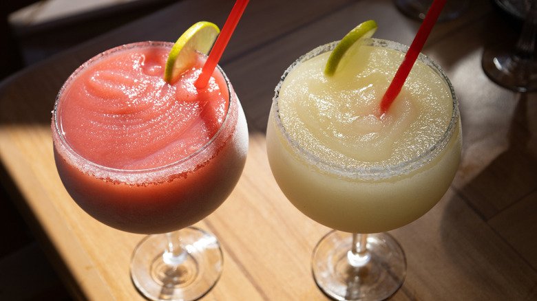 Two frozen margaritas in glasses
