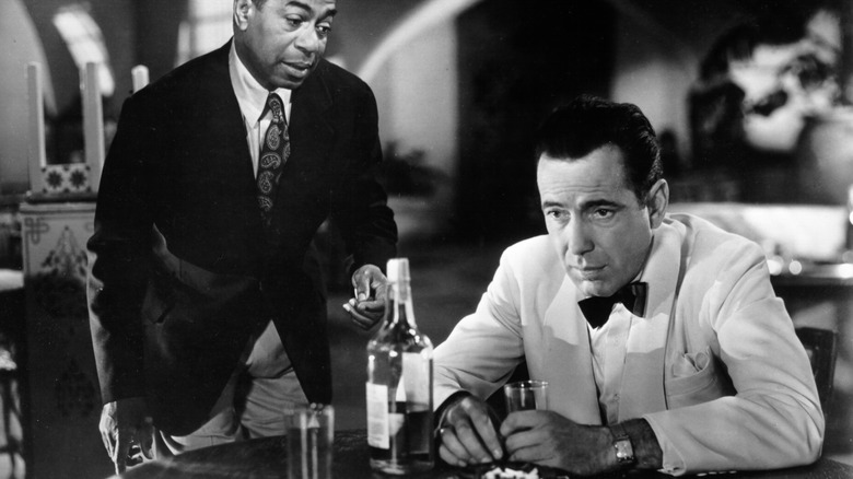 A movie still from "Casablanca," featuring Humphrey Bogart and Dooley Wilson as Rick Blaine and Sam, in the famous bar scene from the movie