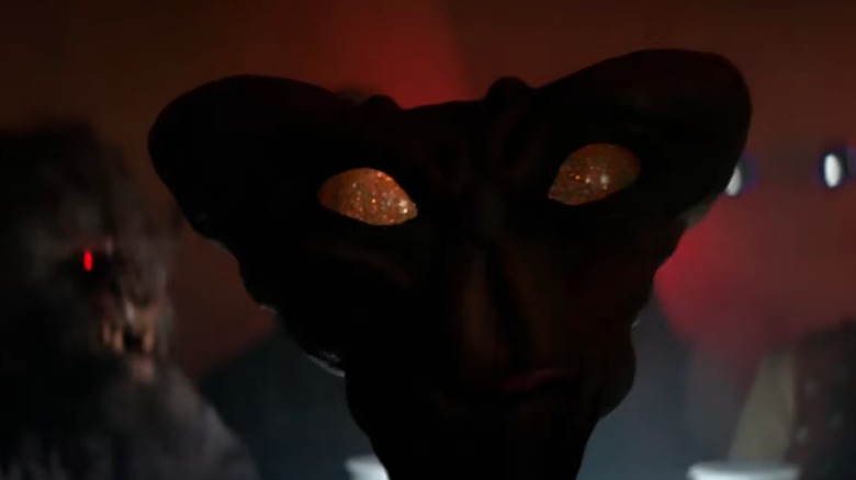 An alien is seen in silhouette, in the cantina scene from "Star Wars: A New Hope"