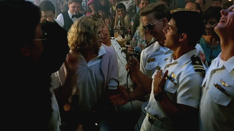 Tom Cruise, in character as Maverick, sings to Kelly McGillis in the famous bar scene from "Top Gun"