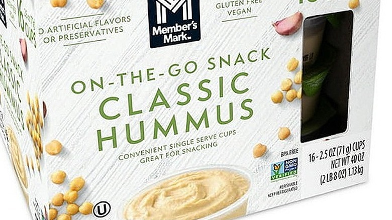 a box of on the go snack classic hummus, with photos of the dip and of chick peas