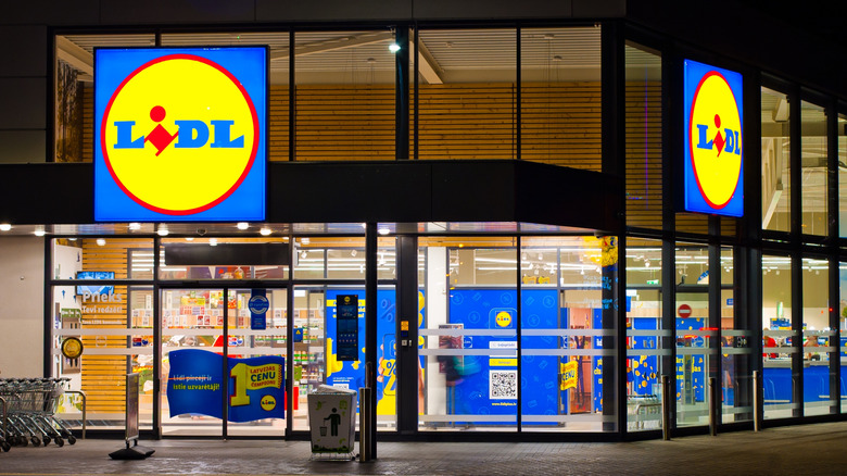 Lit up Lidl storefront at night