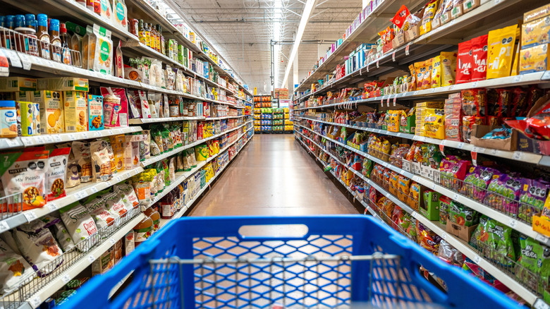 Blue Walmart cart in food aisle