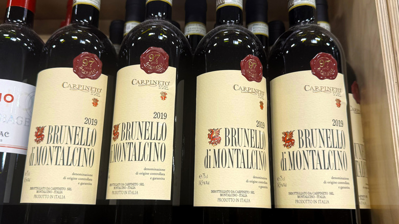 rows of wine bottles standing in wine crate at costco