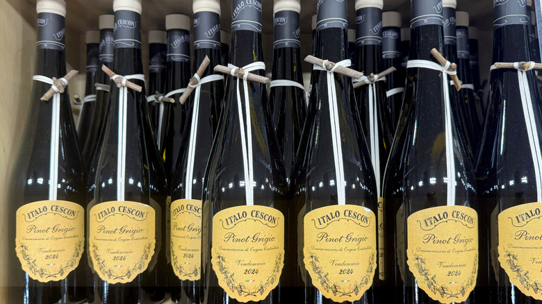 rows of wine bottles standing in wine crate at costco