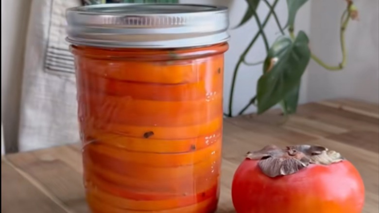 bowl of sliced pickled persimmons