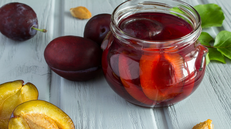 pickled plums in a jar
