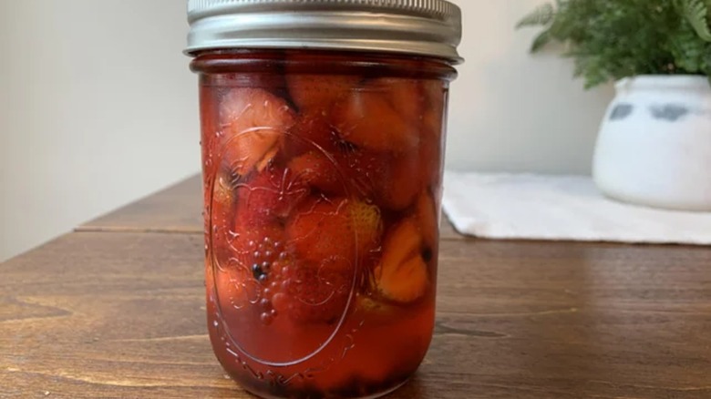 pickled strawberries in a jar