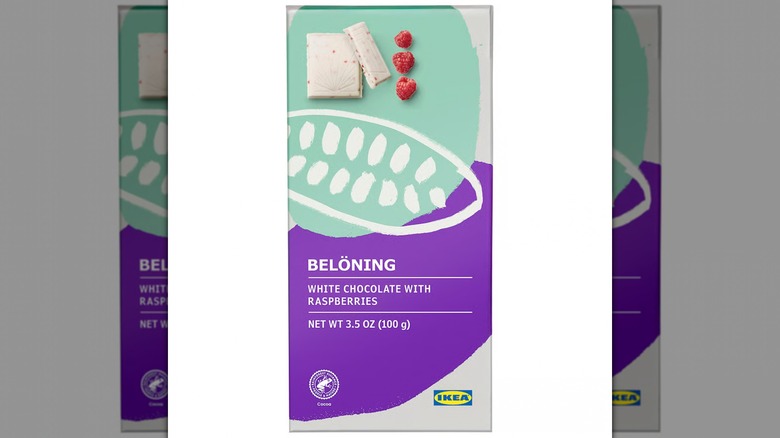 A Belöning White Chocolate bar with Raspberries on a white background