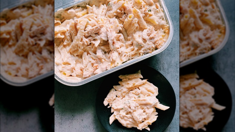 Costco's chicken alfredo in a metal pan and plated