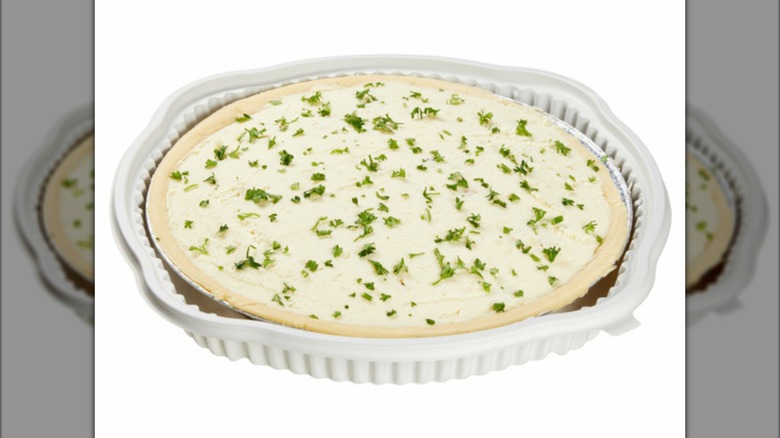 A Costco shepherd's pie in a tin baking dish on a white background