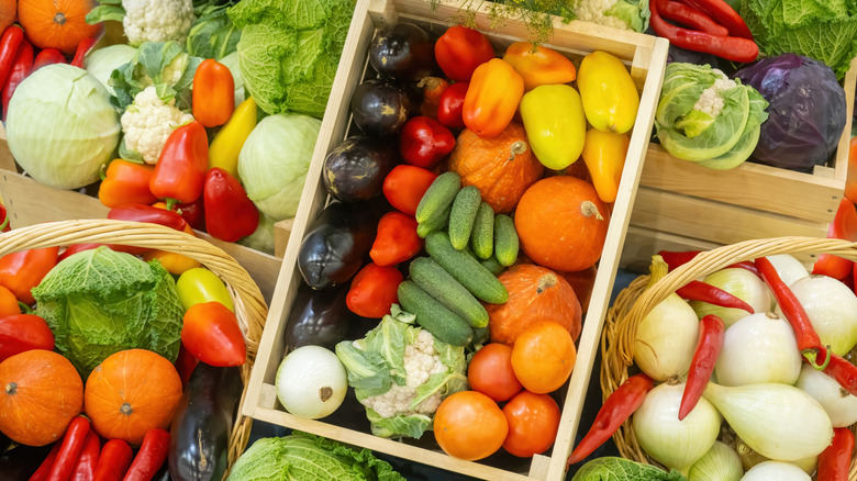 A selection of fresh vegetables is seen from overhead