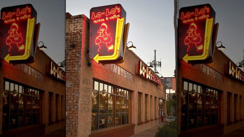 The exterior of Lo-Lo's Chicken and Waffles in a rustic brick building