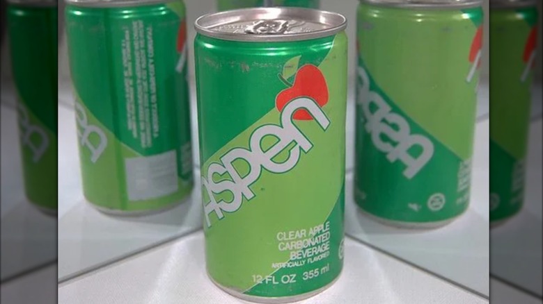 An Aspen soda, with mirrors showing it from all sides