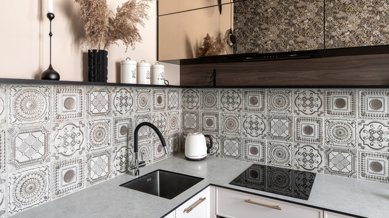 Ornamental tile kitchen backsplash