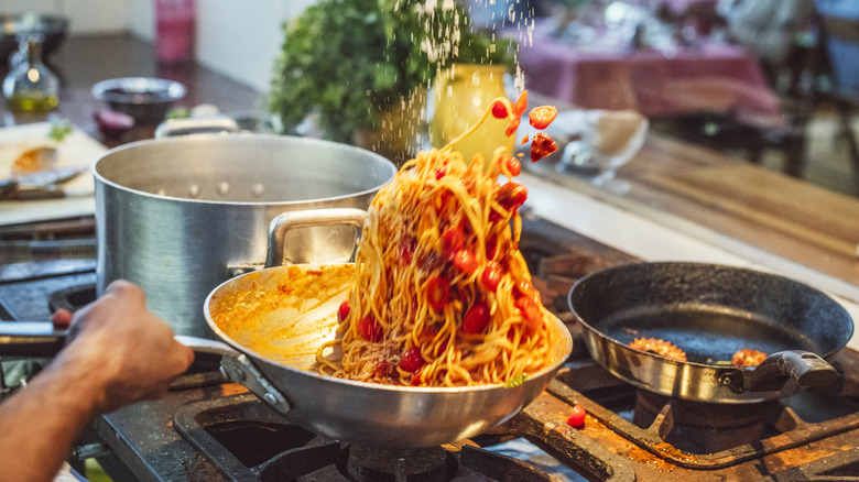 Pasta cooking in sauce