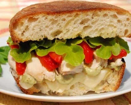 Toasted Tuscan Chicken Sandwich with Roasted Red Peppers, Fontina, and Pesto Mayonnaise 