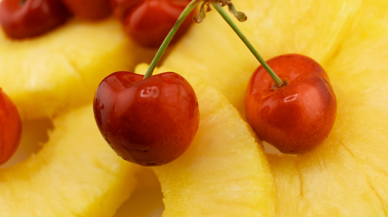 Close-up of pineapple rings and cherries