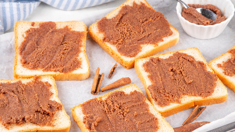 Slices of toast with cinnamon spread on a table cloth