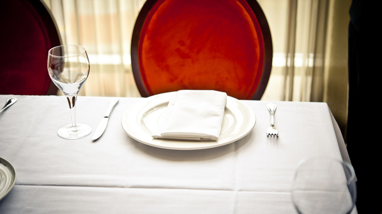 A table is prepared with a table setting