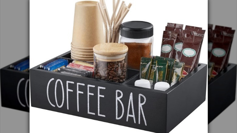 Coffee bar station organizer in black with "coffee bar" written in white text on white background