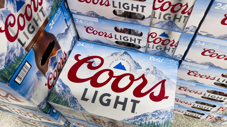 Cases of Coors Light are pictured stacked up in a store