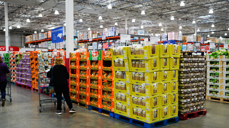 Woman looking at groceries at Costco