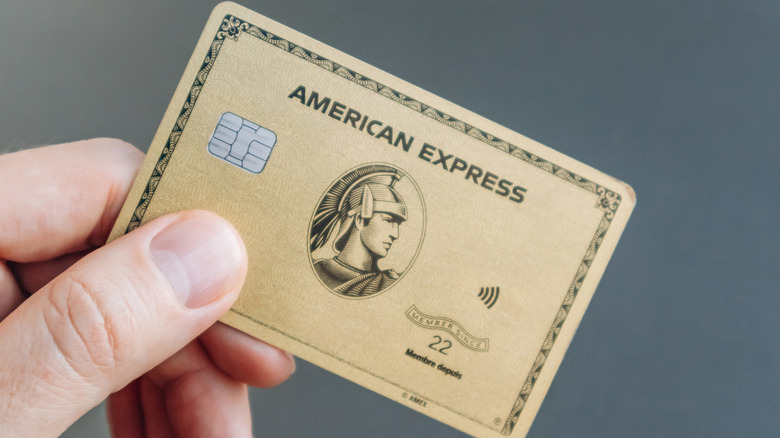 Hand holding American Express card
