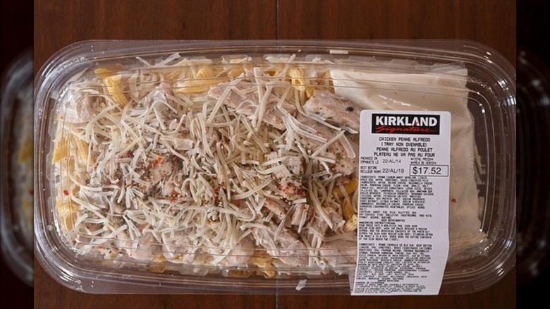 Costco Kirkland Signature Chicken Alfredo with Penne Pasta in a plastic container