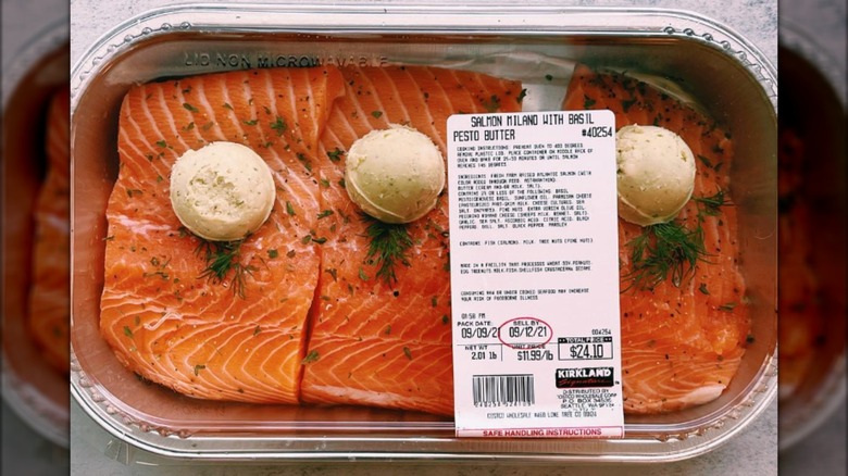 Costco's Salmon Milano with basil pesto butter in a metal tray