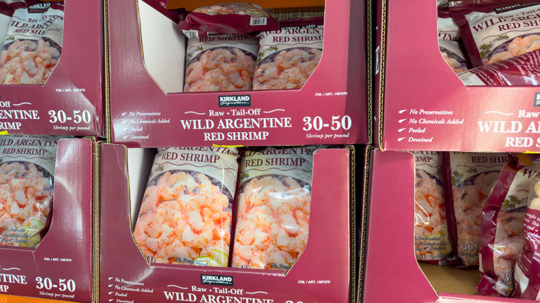 Packs of Kirkland Signature Wild Argentine Red Shrimp on display at Costco