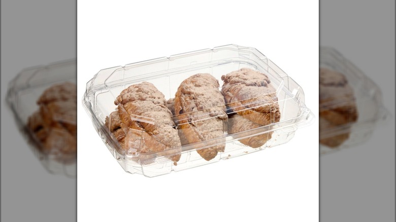 Plastic clamshell of Costco Bakery Twice Baked Cinnamon Filled Croissants