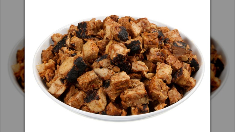 Chargrilled chipotle seasoned chicken in a bowl