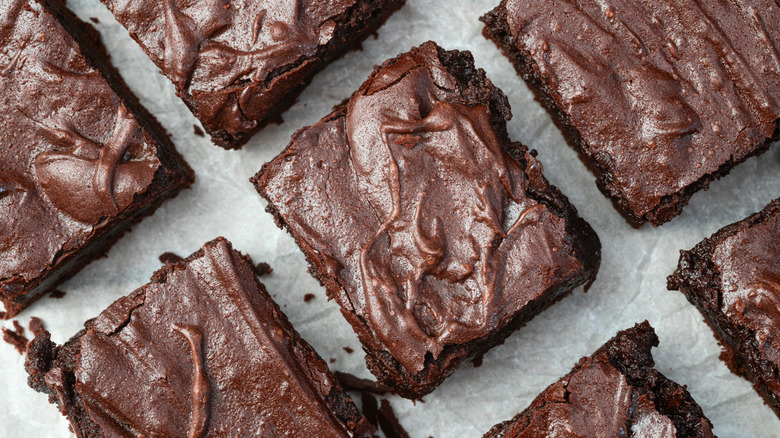 Chocolate brownies on a white table