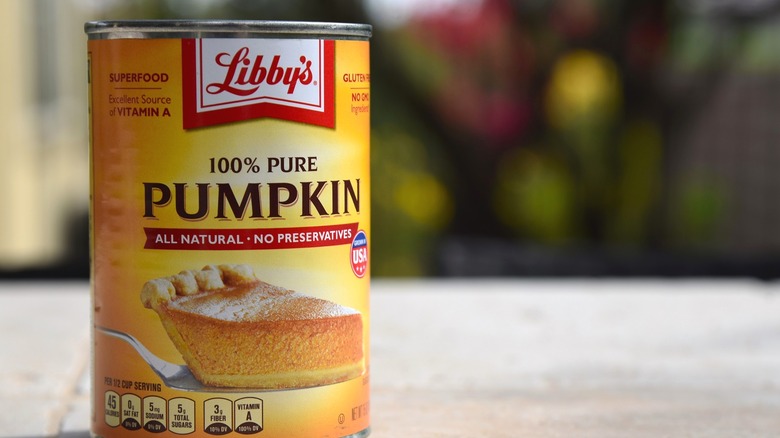 A can of Libby's 100% pure pumpkin placed on a table