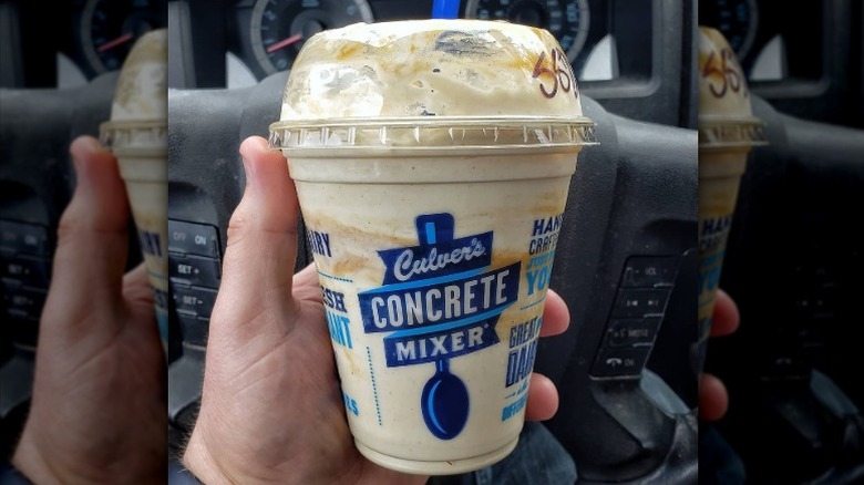 A person holding a concrete mixer from Culver's