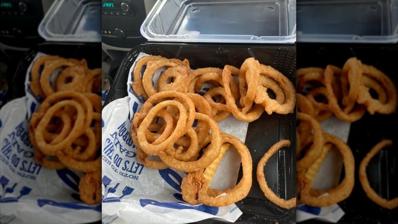 Onion rings from Culver's in a takeout box