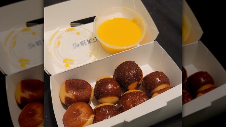 Pretzel bites and cheese sauce from Culver's in a takeout box