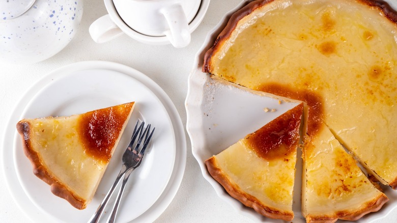 Water pie with a slice out of it on plate