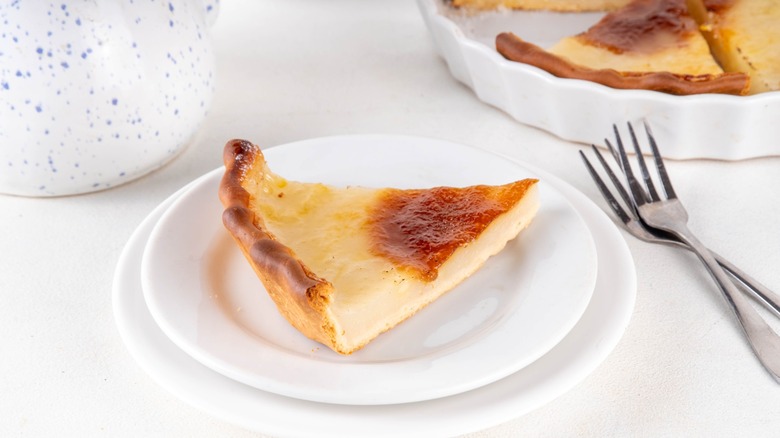 A slice of water pie on white plate