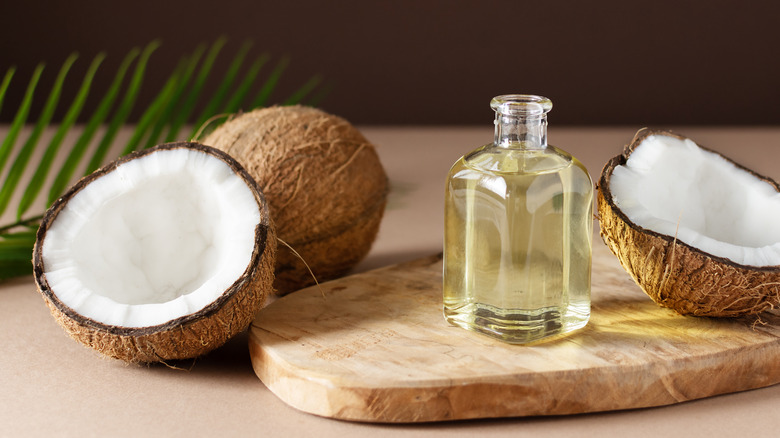 coconut oil next to coconuts