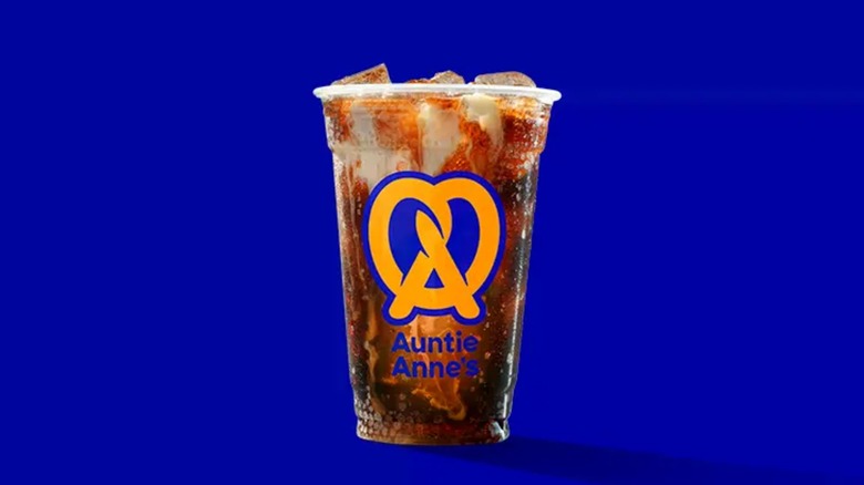 An Auntie Anne's Twisted Sip made of dark soda and French vanilla creamer