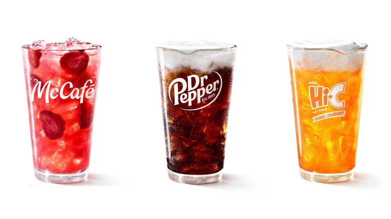 3 pint glasses of McDonald's Strawberry Watermelon Refresher, Dirty Dr Pepper, and Orange Dream