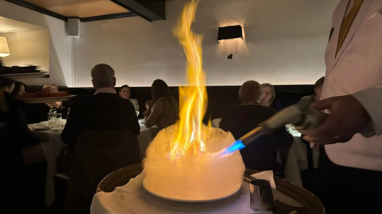 Flaming Cotton Candy Baked Alaska dish at Phillipe Chow